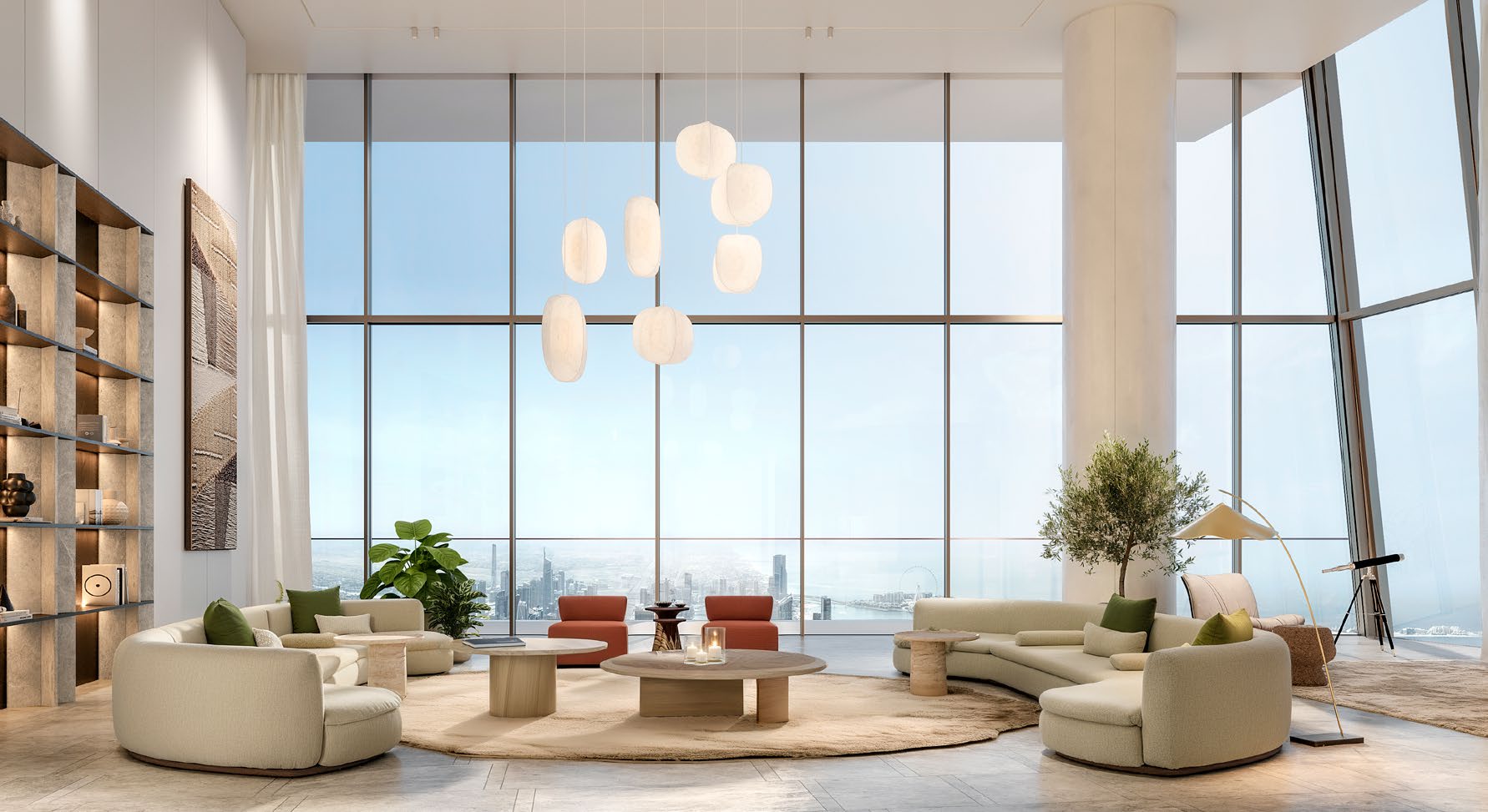 Double-height lounge with curved sofas and full-height glazing